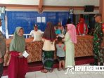 Sinergisitas Babinsa dan Babinkamtibmas dalam Pengamanan Bantuan Beras di Desa Kaliwungu