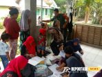 Serda Muhammad Sholeh Ridwan dalam rangka pendampingan giat Posyandu di wilayah Serda Muhammad Sholeh Ridwan dalam rangka pendampingan giat Posyandu di wilayah