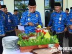 Penjabat (Pj) Bupati Probolinggo H Ugas Irwanto, S.Sos., M.Si didampingi Staf Ahli, Asisten dan sejumlah pejabat di lingkungan Pemerintah Kabupaten (Pemkab) Probolingg, Tasyakuran ini ditandai dengan pemotongan tumpeng