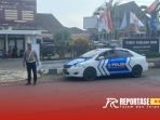 Kegiatan patroli dan pengaturan lalu lintas di depan kantor KPU