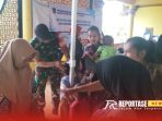 Pendampingan dalam kegiatan pelayanan Posyandu di kantor desa